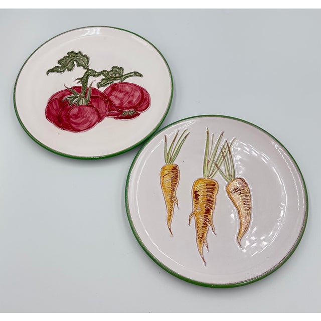 Add a touch of timeless elegance to your dining experience with this stunning 2-piece set of vintage Italian Majolica...