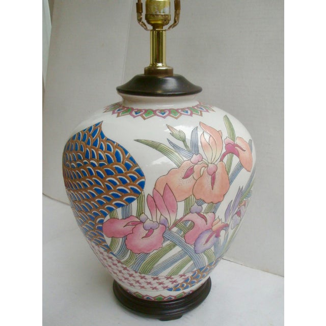 Here's a 1980s postmodern pastel colorway take on Chinoiserie in this ginger jar form lamp with loads of visual impact!...