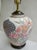Here's a 1980s postmodern pastel colorway take on Chinoiserie in this ginger jar form lamp with loads of visual impact!...