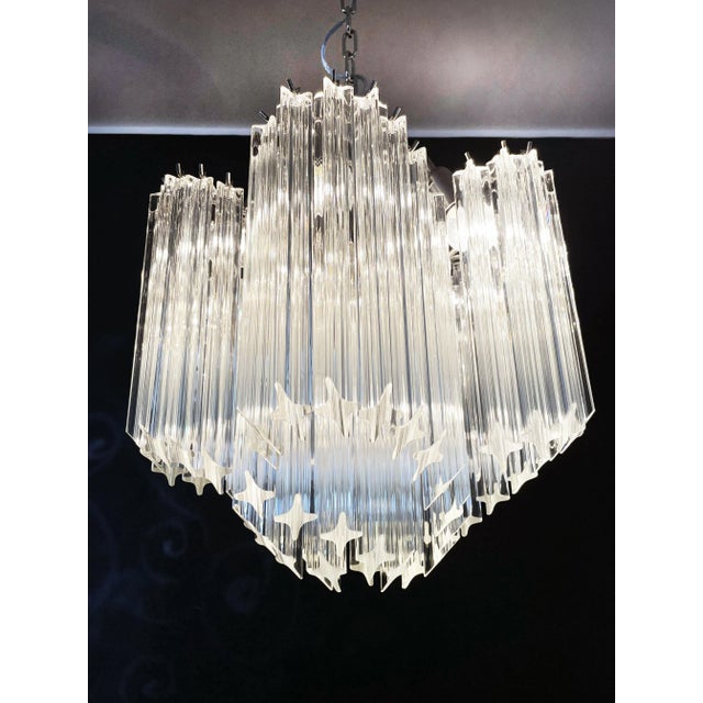 A magnificent Murano glass unique chandelier, spiral shape, very elegant, 60 trasparent quadriedri on nickel metal frame....