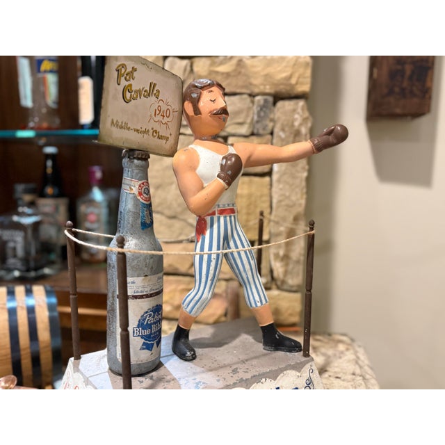 An exceptional and highly collectible Pabst Blue Ribbon back bar advertising display manufactured by Plasto Mfg. Co. of...