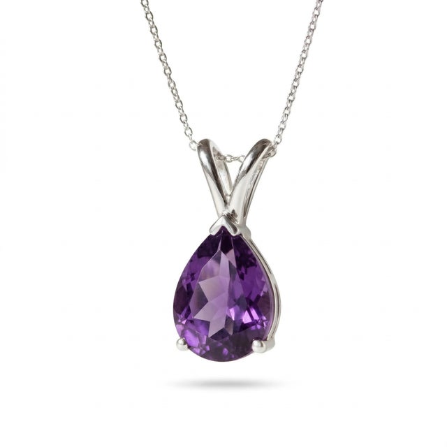 This elegant pendant features a stunning Amethyst gemstone, prized for its rich violet hue and timeless sophistication....