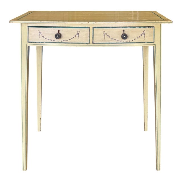 An elegantly proportioned Hepplewhite bow-front dressing table consisting of a curved top projecting over two drawers, one...