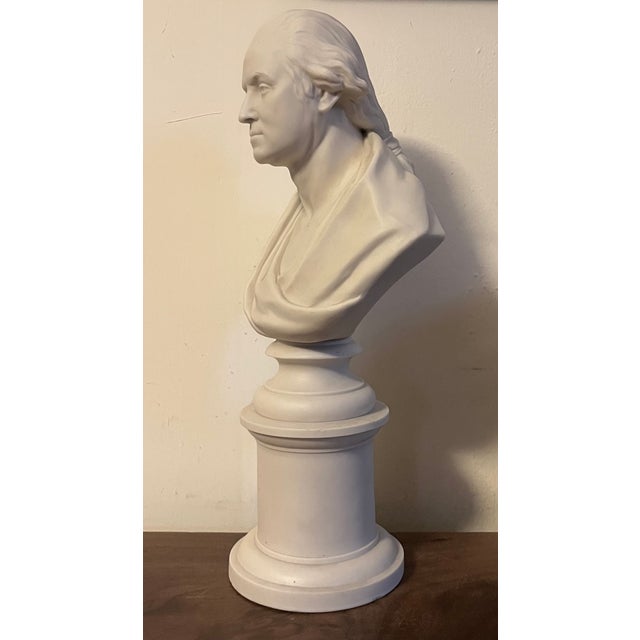 Antique 19th century English parian porcelain bust of president George Washington after Jean-Antoine Houdon. Mounted on a...