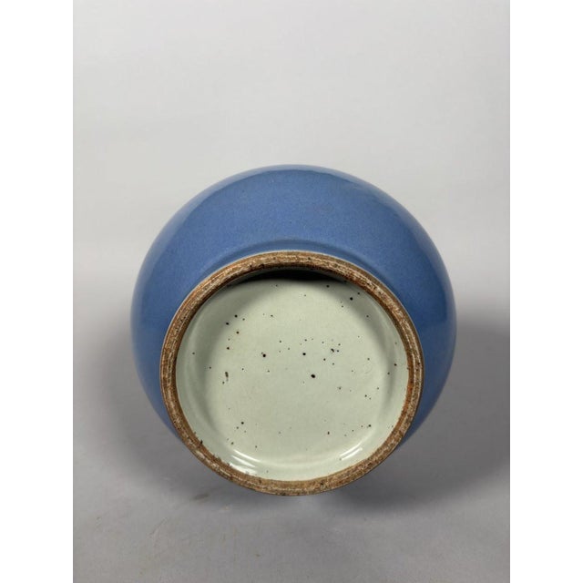 Chinese porcelain bottle vase, Qianlong period (1736-1795). Early 18th century , circa 1750. Monochrome blue glaze....