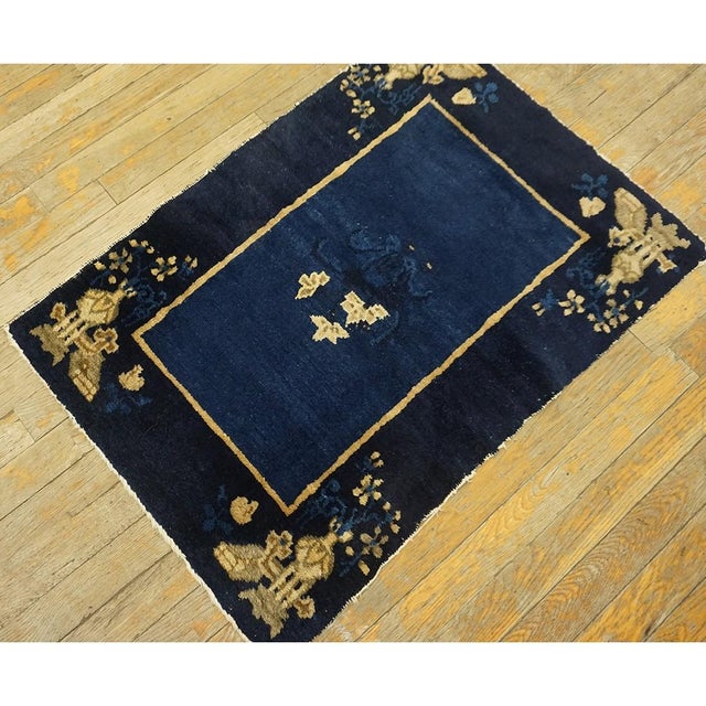 Chinese - Peking Square Small Scatter Size 1900s Antique Blue Knotted Wool Rug, Circa Date: 1900s. This exquisite piece...