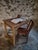 This rustic French farmhouse table was crafted from solid oak around 1900. The piece features a natural, time-worn patina...