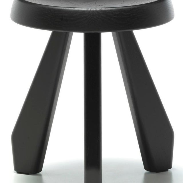 Stool model Meribel designed by Charlotte Perriand in 1953-61. Oak stained black. Relaunched by Cassina in 2011....
