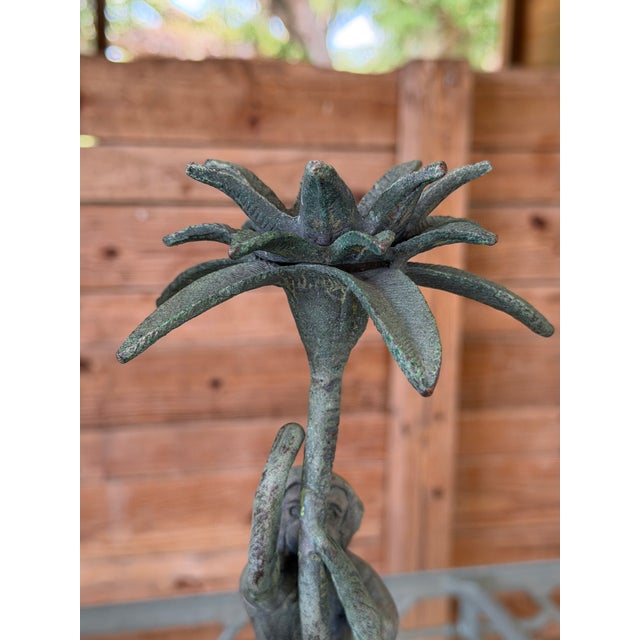 Add a touch of tropical whimsy to your décor with this charming pair of vintage monkey candlesticks styled after the...