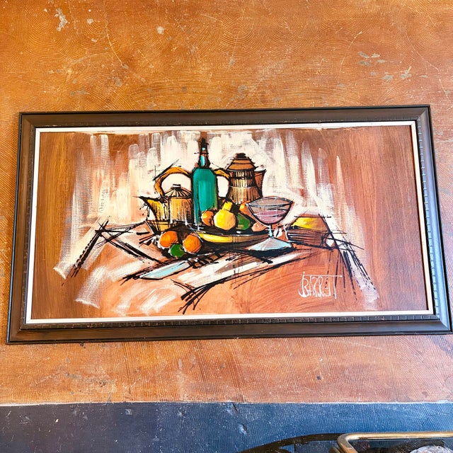 A vibrant vintage mid-century modern still life painting featuring an expressive arrangement of fruit, bottles, glassware,...