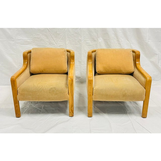 A rare and highly collectible pair of vintage club chairs designed and manufactured in Los Angeles, California by...