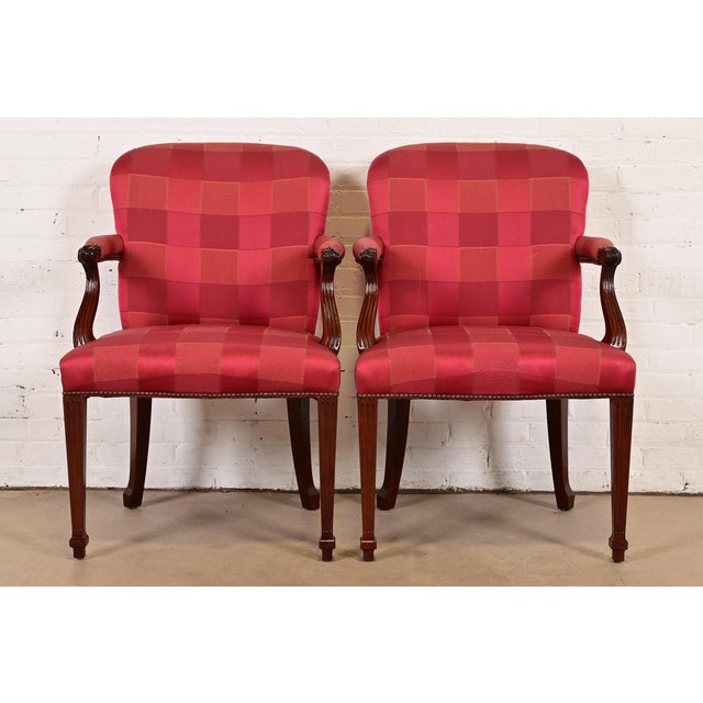 A gorgeous pair of English Regency or Louis XVI style armchairs or dining captain chairs By Baker Furniture USA, Circa...