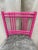 Adorable bright pink chair with faux fur. Easily reupholstered if you like. Cute faux bamboo design. Great for a desk or...