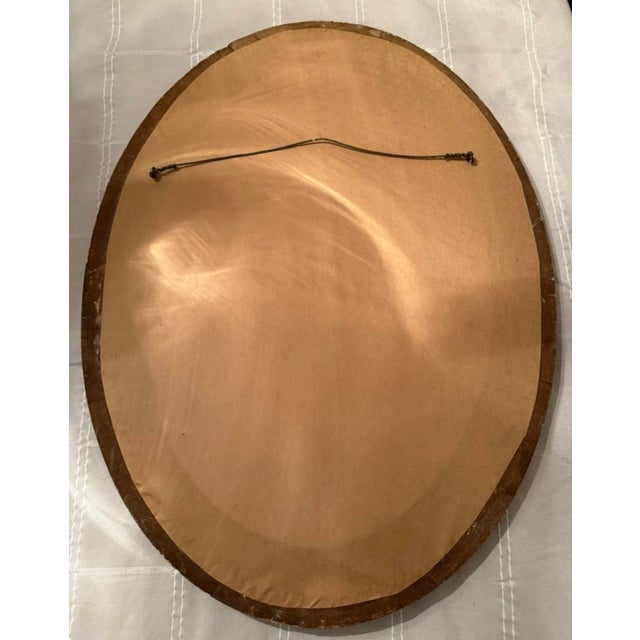 This antique hand-tinted photo frame features an ornate Victorian design with a convex bubble glass front, measuring 19x25...