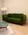 The sofa has been reupholstered in green velvet, giving it a fresh and elegant look. The color and shape are timeless and...