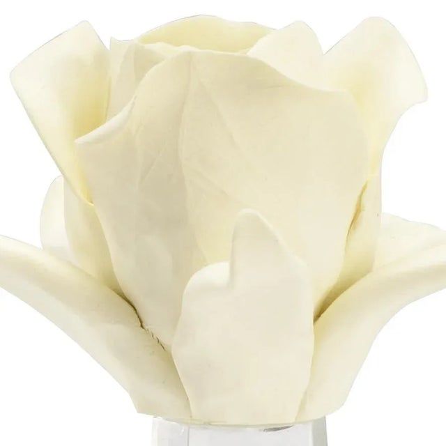 Cream porcelain rose on clear crystal vase