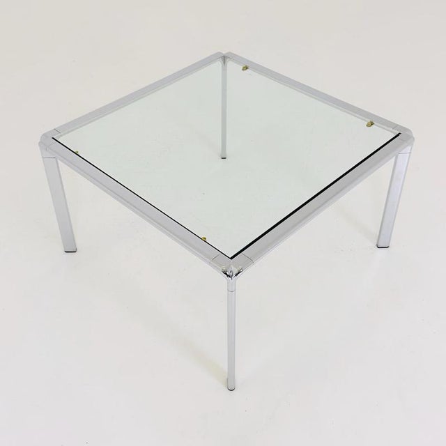 A rare and beautifully designed mid-century modern / Bauhaus-inspired square coffee table, made in Italy during the 1980s....