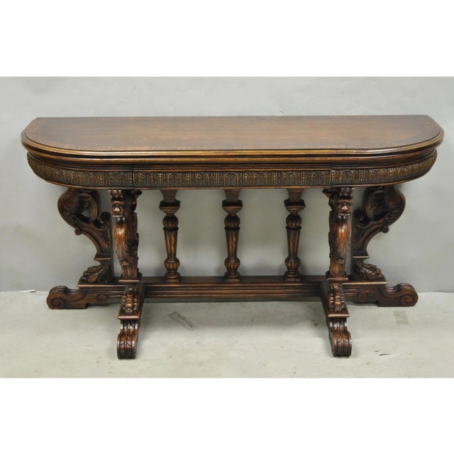 Antique Italian Renaissance Revival Figural Carved Griffin Oak Flip Top Library Table. Item features 3 drawers, expanding...
