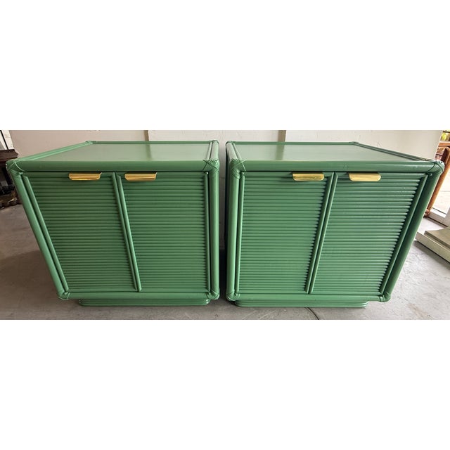 Pair of vintage campaign nightstands from 70's. Newly professionally refinished in a satin green color. Elegant ribbed...
