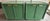 Pair of vintage campaign nightstands from 70's. Newly professionally refinished in a satin green color. Elegant ribbed...