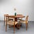 High-quality dining table by Glostrup, Denmark, 1970s. Solid, heavy teak tabletop on a central frame. The table is...