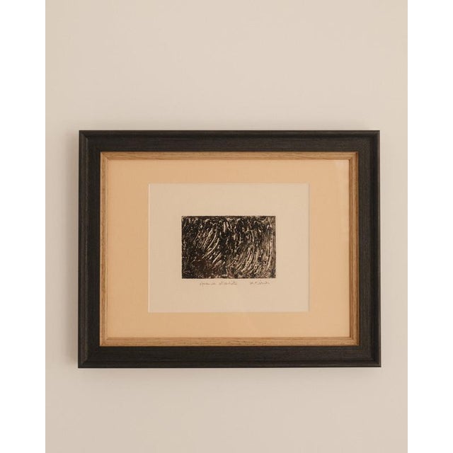 Sweeping black gestures race across a white field in this untitled etching, creating a dynamic interplay of light and...