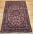 "This antique Persian Malayer area rug, woven in the early 20th century, is a striking example of the refined village...