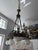 Empire Style Chandelier with finely decorated opal glass shades. This multi-light chandelier captivates with its...