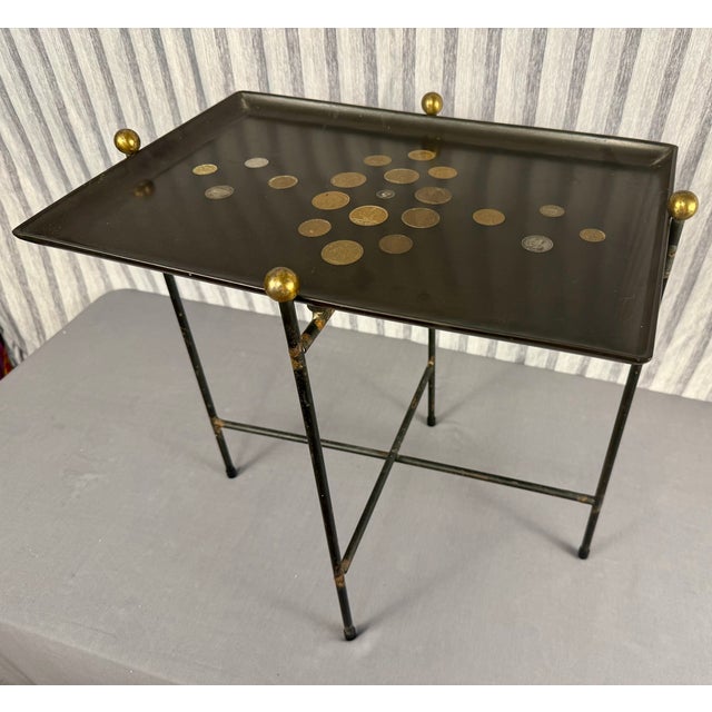 This Mid-Century "Coins of the World" tray with original folding stand was made in the 1950s or 60s. Although it is...
