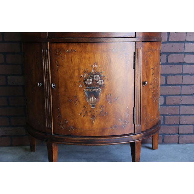 Collector's Classics demilune console cabinet by Ethan Allen. Infusing a collected over time appeal, designed with...