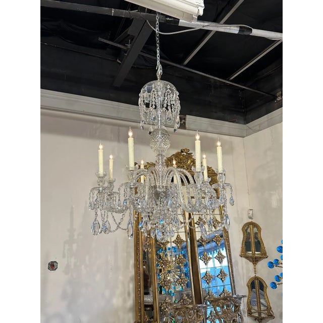 Gorgeous 19th century English Waterford style 8-light chandelier. Circa 1900. The chandelier has been professionally...
