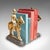 This is a pair of antique mounted horse rider bookends. An English, polished bronze and cast iron figural book rest,...