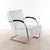 Chrome-plated steel tubing. Upholstered. White leather cover with black piping. Black lacquered wooden armrests. I have...