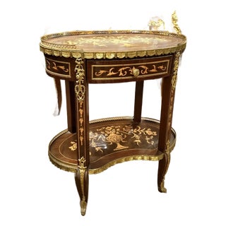 Elegant Oval Accent Table With Inlaid Wood, Brass Gallery, Drawer & Lower Shelf For Sale