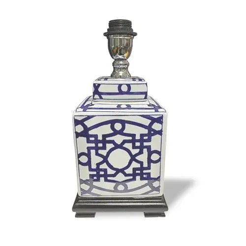 Blue and White vase lamp is delightful with the dark blue pattern. The contrast is sharp on a walnut base with a square...