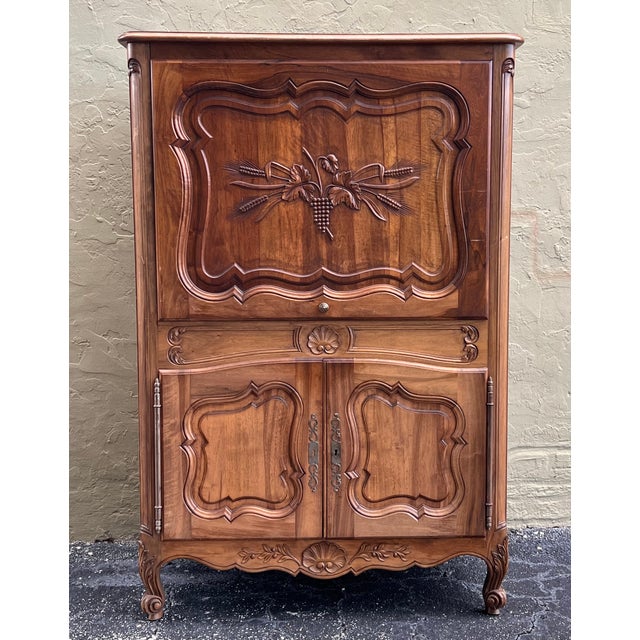 About the Item Mid 20th century walnut Spanish front cabinet with molded carvings and two compartments, the hight...