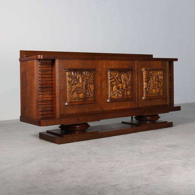 France / 1925 / Sideboard / Jacques Klein / oak / Art Deco A rare and sculptural creation by renowned French decorator and...