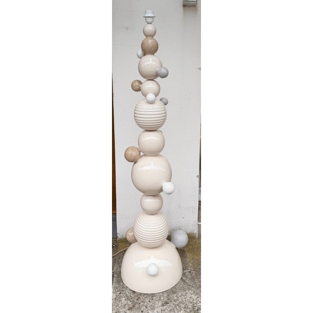 Floor Lamp Atomo in natural colore ceramic terracotta, design by the Italian artist designer Antonio Cagianelli. Sign with...