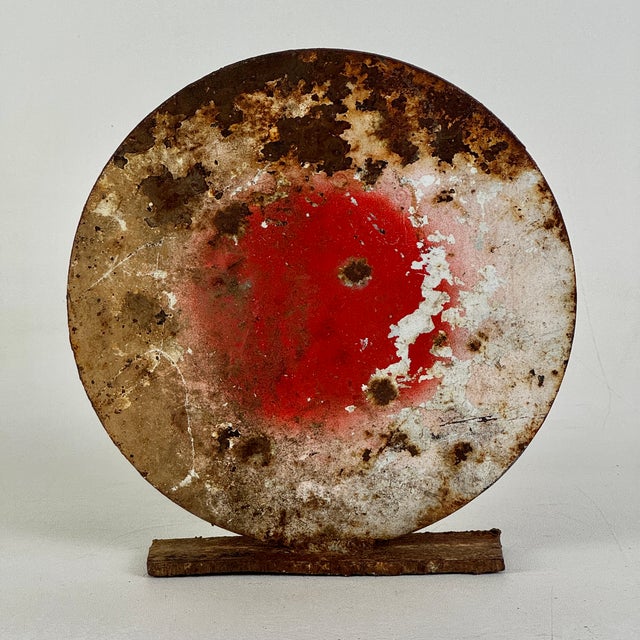 A unique hand made metal shooting target in red paint. Great home accent or to add to a collection. Circa: Mid 20th...