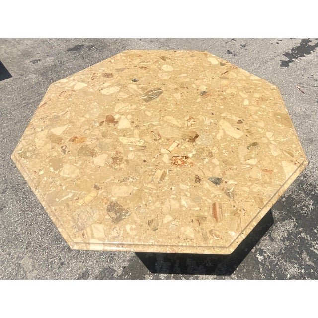 Romanesque Elegance: The Vintage Italian Octagon Stone Dining Table merges Old World grandeur with American sensibility....
