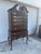 Elegant vintage Drexel highboy chest of drawers featuring a tall silhouette, multiple drawers, and classic traditional...