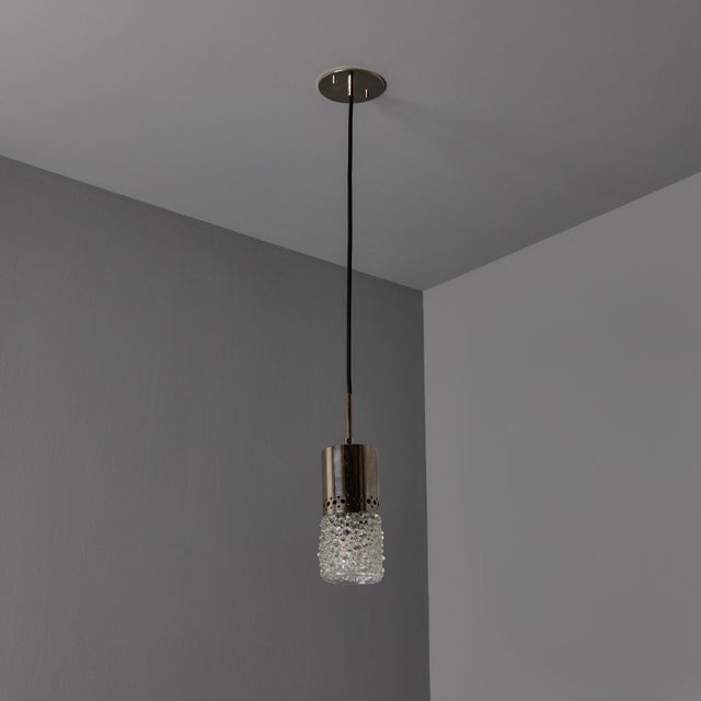 Pair of 1960s Chrome Metal and Bubble Glass Pendants by Helena Tynell Executed in thick and heavy sculpturally textured...