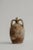 Hand-thrown terracotta vessel from Puglia, Italy, originally used for storing and carrying water or oil. Years of handling...