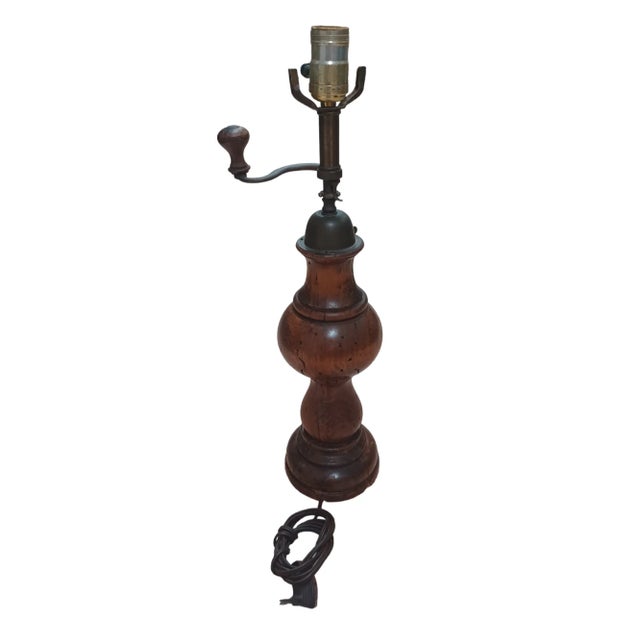 Antique wooden Peppermill made into a table lMp. Peppermill has brass placard attached dating it to 1781?