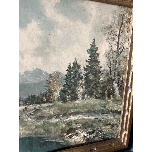 Gorgeous mountain lake with snow capped mountains and evergreens in the background. This is a unique piece. Oil painted on...