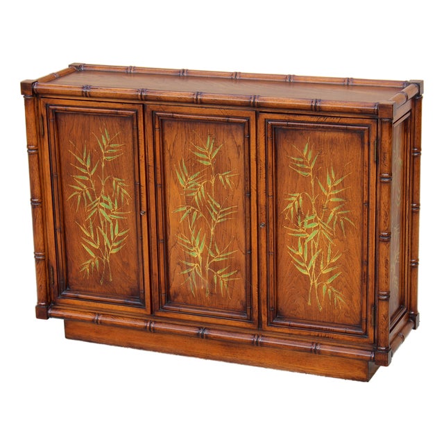 Elevate your interior with this striking vintage Hollywood Regency credenza from the Brandt Furniture Company, Embassy...