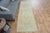 This vintage hand-knotted area rug is a semi-antique vintage area rug. The '70s Eastern region of Anatolian's unique rug...