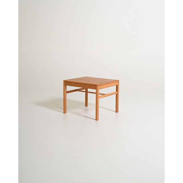 Square oak coffee table, "Casino," designed by Sven Engström and Gunnar Myrstrand and produced in Sweden by Tingströms in...