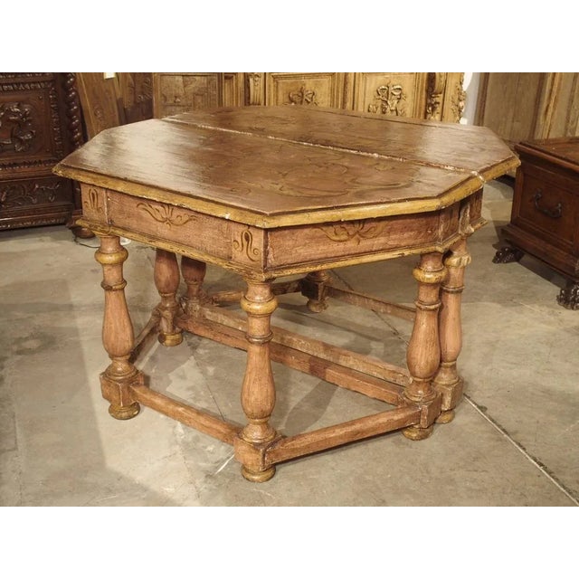 These beautiful antique Italian console tables are painted in an old rose and ochre/gold, and when pushed together, form a...