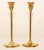 Pair of brass polished candlesticks with a molded hexagonal base. Pair of Swedish 20th century hand-tooled brass...